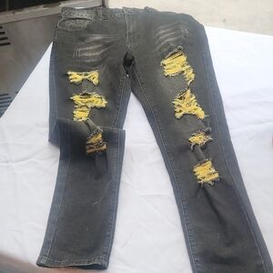 Distressed Black Jeans with Yellow Accents